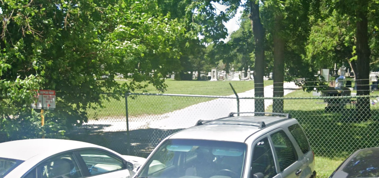 Barbed Wire Fence in Parking Lot Barbed Wire Fence in Parking Lot